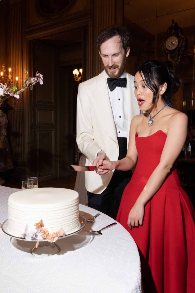 cake cutting - Pretty Spring Meridian House Wedding with Catholic Ceremony