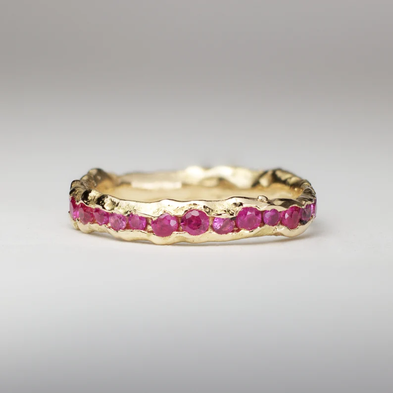 channel set ruby eternity band - unique engagement ring